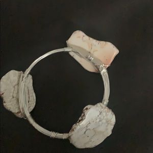 Silver bracelet with white opal stands